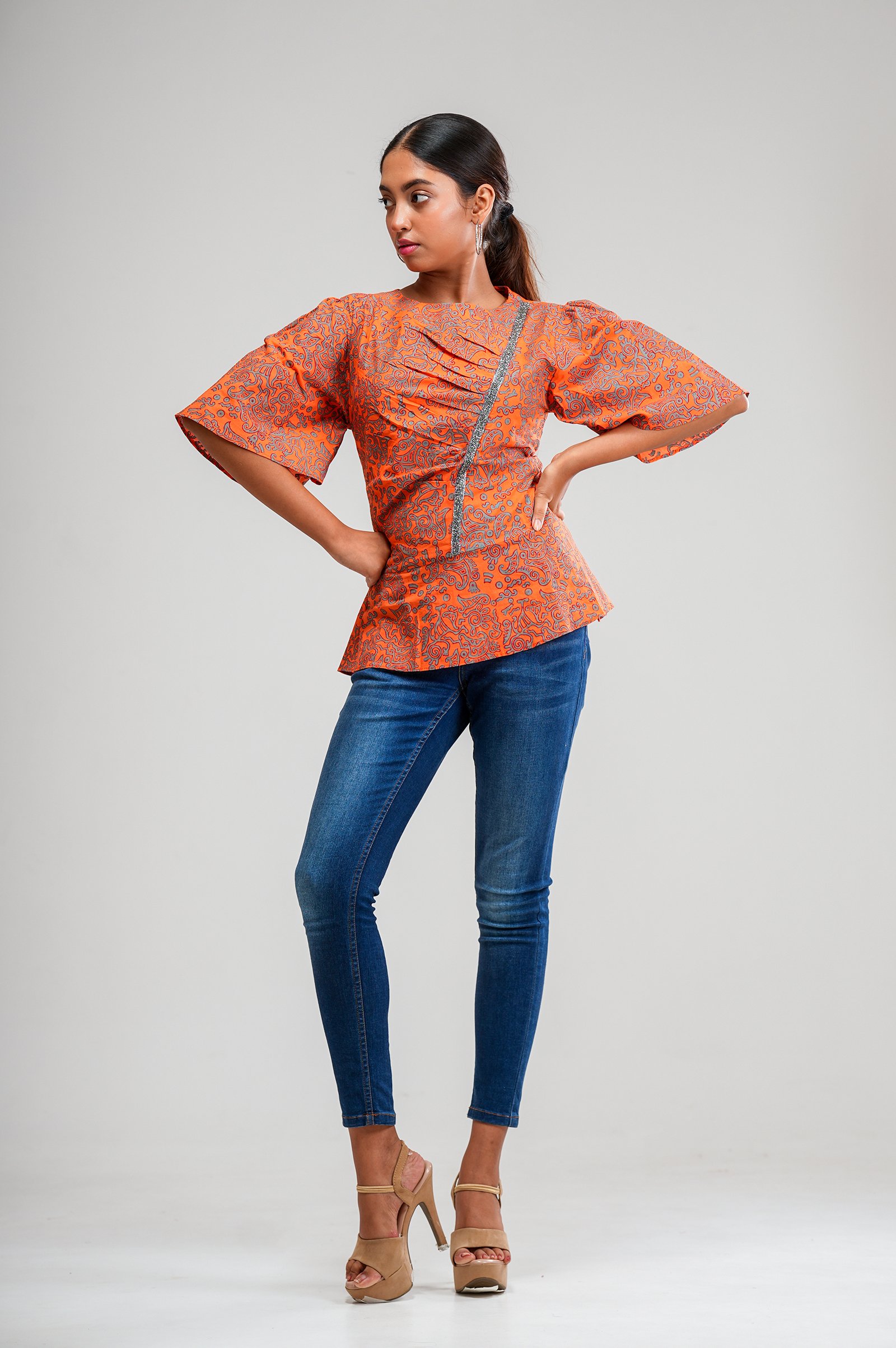 Bivala Orange Peplum Top